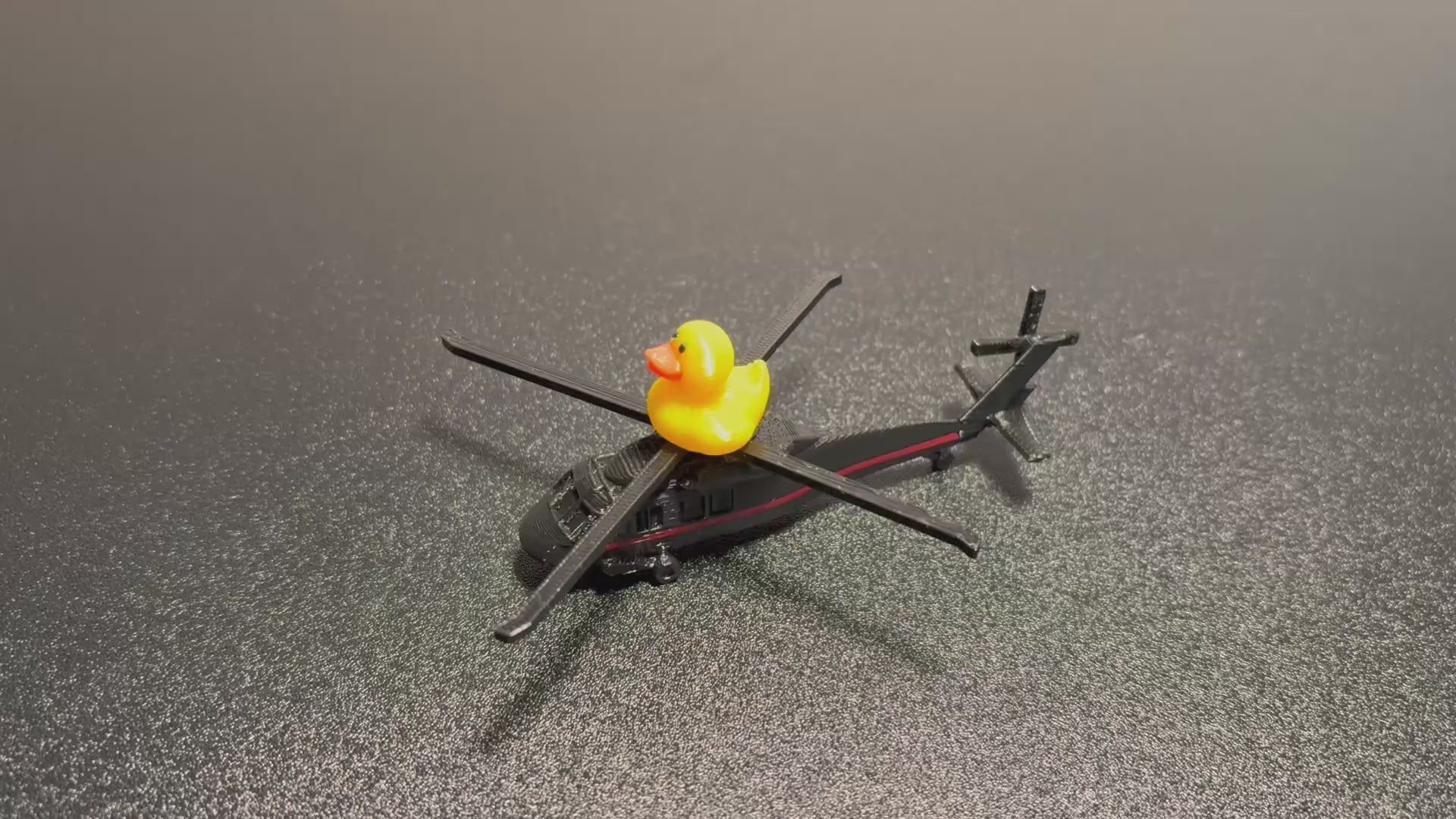Duck on a Helicopter with Red Accent